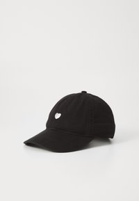 Black cotton baseball cap with a curved brim and a silver heart-shaped accent on the front. Plain design with six ventilation eyelets.