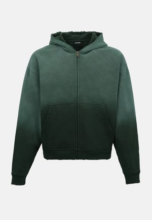 Φούτερ με φερμουάρ σε σκούρο πράσινο χρώμα, με μπροστινές τσέπες, ριμπ μανσέτες και ελαφρώς φθαρμένη άκρη στην κουκούλα.