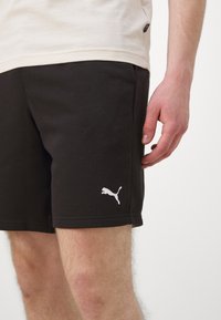 Puma ESSENTIALS - Športové šortky - black