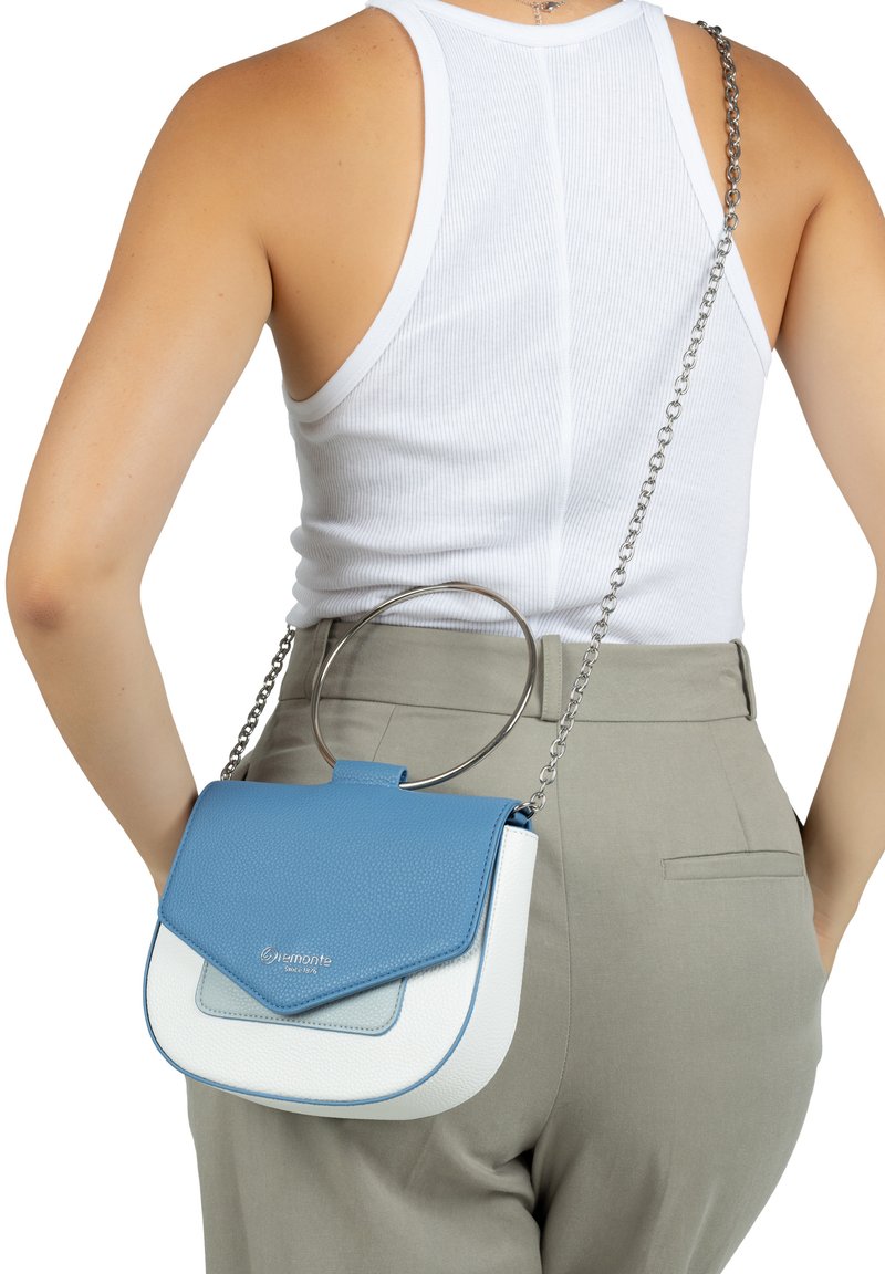 Blue and white leather handbag with a structured shape, textured finish, silver chain strap, and a circular metal accent on the top.