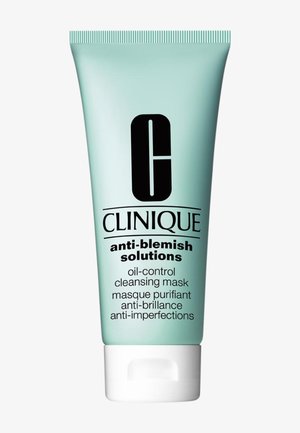 Masque nettoyant anti-imperfections Clinique dans un tube turquoise. Présente un texte noir, un bouchon à charnière et une texture matte lisse.