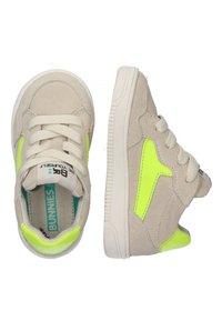 Beige suede sneakers with bright yellow-green accents, rubber sole, classic lace closure, and padded collar for comfort.