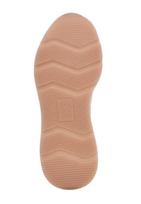 Lichte sneakerzool van zachte beige rubber, met een zigzagloopvlakpatroon voor grip en een ingekapseld merklabel in het midden.