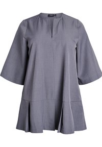 Šedý tunikový top s kulatým výstřihem, krátkými zvonovými rukávy a vrstevnatým lemem. Vyrobeno z měkké, strukturované látky s jemným vzorem.