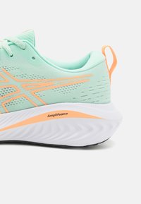ASICS GEL-EXCITE 10 - Road running shoes - mint tint/bright orange