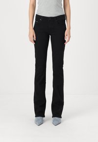 Marc O'Polo DENIM TROUSERS MID WAIST FLARED - Platėjantys džinsai - black
