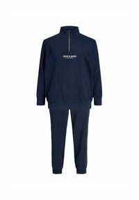 Mörkblå träningsdräkt med dragkedja i kragen, elastiska ärmslut och midjeband. Delen har en vit "Jack & Jones" logotyp tryckt på bröstet.