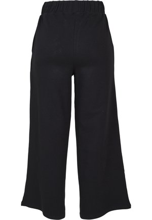 Pantaloni neri a gamba larga realizzati in tessuto morbido con vita elasticizzata; presentano un design semplice e senza hardware o motivi visibili.
