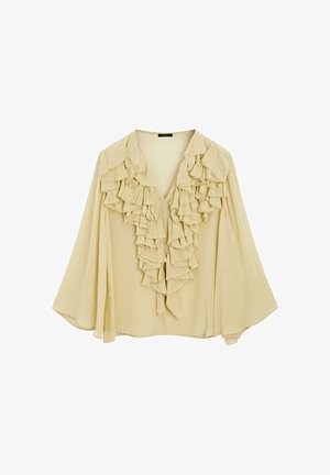 Beige Bluse mit tiefem V-Ausschnitt, die vertikale Rüschendetails an der Vorderseite aufweist. Der Stoff wirkt weich und leicht mit einem fließenden Design.