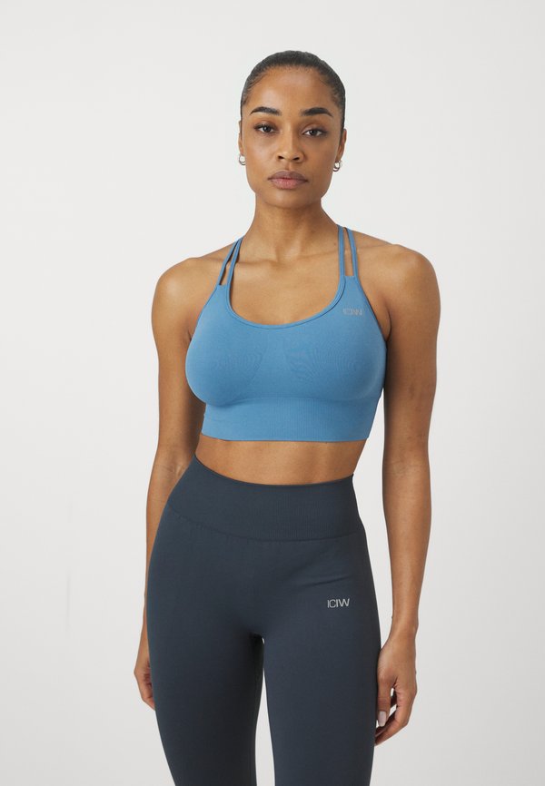 DEFINE SEAMLESS BRA - Medium support sports bra - light teal4