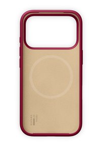 Custodia per telefono con bordi color bordeaux, retro beige con indicatore circolare di ricarica MagSafe e marchio "Ideal of Sweden" nell'angolo.