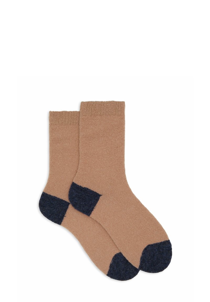 Calze lavorate a maglia, corpo beige con accenti blu scuro su tallone e punta, polsino a coste in cima, tessuto morbido, lunghezza standard a metà polpaccio.