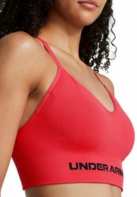 Under Armour VANISH SEAMLESS LOW - Sujetadores deportivos con sujeción ligera - racer red