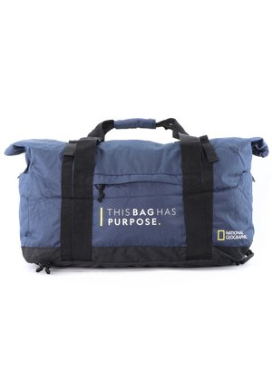 Blue duffel bag with black bottom, carrying handles, and adjustable shoulder strap. Features "THIS BAG HAS PURPOSE." and National Geographic logo.