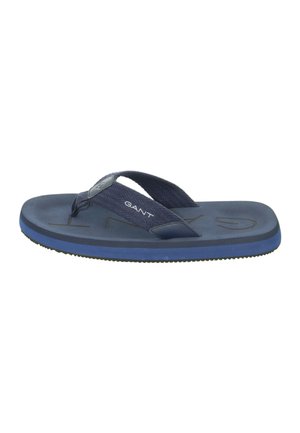 Navy flip-flop with a textured fabric strap, flat sole, and a rubberized blue bottom. Features embossed logo on the footbed.