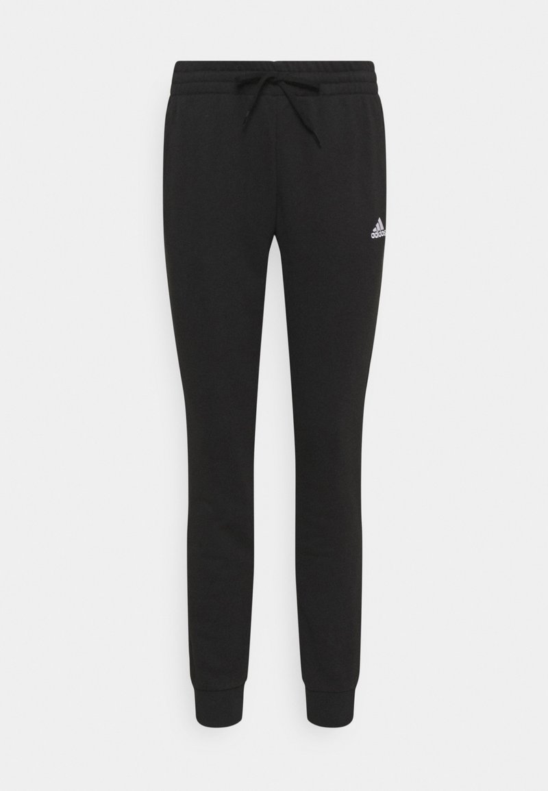 Zwarte sweatpants gemaakt van een katoenmix. Voorzien van een elastische tailleband met verstelbaar trekkoord en ribbelboorden. Klein wit logo.