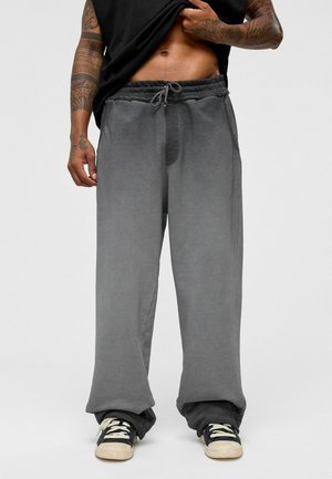 MARK - Trainingsbroek - black