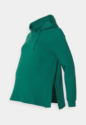 Green maternity hoodie with a hood, side slits, long sleeves, and soft texture. Features a drawstring and relaxed fit for comfort.