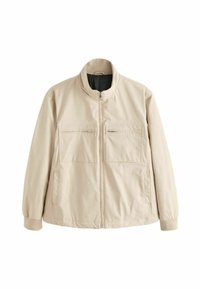 Beige lichtgewicht jas met een hoge kraag, voorzien van twee voorzakken met rits en elastische manchetten, gemaakt van glad, duurzaam materiaal.