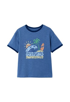 Blue short-sleeve T-shirt with navy trim and a colorful surfing-themed graphic featuring a wave, palm tree, surfboard, sun, and the word "SURFING."