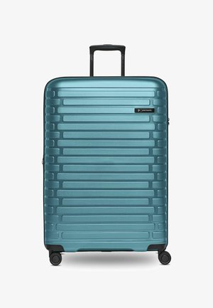 Valise rigide de couleur sarcelle, avec des rainures horizontales, des accents noirs, une poignée rétractable et quatre roues pivotantes pour une manœuvrabilité facile.