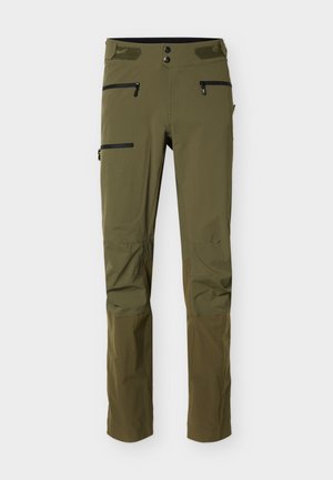 Pantalones verdes oliva para exteriores con tiras ajustables en la cintura, múltiples bolsillos negros con cremallera y paneles reforzados en las rodillas y la parte inferior de las piernas.