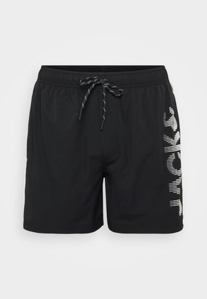 Zwarte zwemshorts gemaakt van lichtgewicht materiaal, met een elastische tailleband met aantrekkoord en een verticale witte logo aan de zijkant.