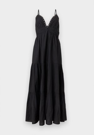Robe maxi noire sans manches avec un décolleté plongeant en V, fines bretelles, étages froncés et détails à clous le long de l'encolure et de la couture du buste.