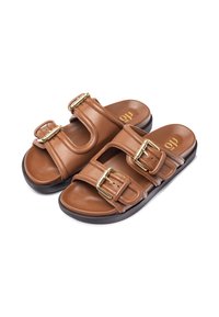 Brown leather sandals with three wide straps, each featuring a gold-tone buckle, textured footbed, and black rubber outsole.