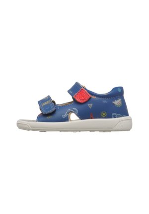 Sandalo blu per bambini con cinturini in velcro rossi e blu, suola bianca e motivi giocosi e colorati che includono dettagli di un uccello e del sole.