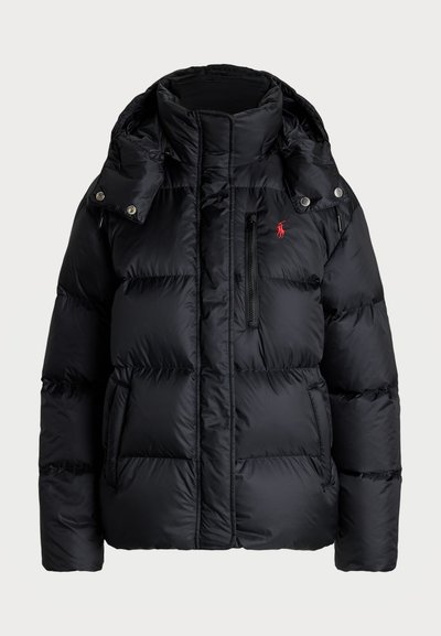 Black puffer jacket featuring a high collar, detachable hood, front zip, horizontal seams, and a red logo on the upper left side.
