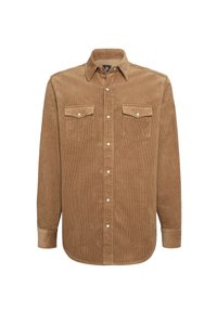 Bruin corduroy shirt met lange mouwen, twee borstzakken en witte knopen. Heeft een puntige kraag en een ribbelstructuur.