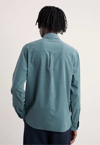 Langsleeve shirt in een gedempt teal kleur, gemaakt van textiel met een structuur, met een klassieke kraag en knoopmanchetten.