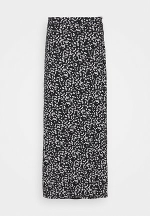 Jupe midi noire avec petit imprimé floral blanc et silhouette droite sur fond uni.