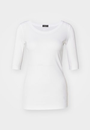 White fitted t-shirt with three-quarter sleeves, soft texture, round neckline, and a side accent detail near the hem.