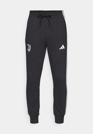 Zwarte joggingbroek met een trekkoord in de taille, voorzien van witte zijstrepen en logo's op het linkerbeen en bovenste rechterbeen. Zachte stoftextuur.