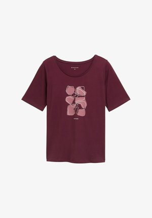 Burgundska majica s kratkimi rokavi z abstraktnim roza grafičnim motivom z belimi konturami na sredini. Mehka tkanina z sproščenim krojem.