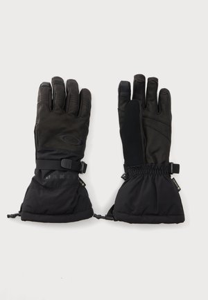 Par sorte isolerede vinterhandsker med håndledsstraps og forlængede manchetter, designet til beskyttelse mod koldt vejr.