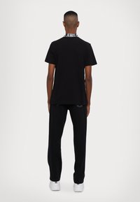 Versace Jeans Couture COLLAR GOTH - Polo shirt - black