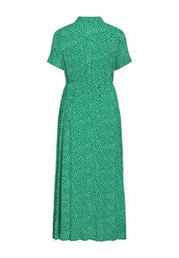 Πράσινο μίντι φόρεμα με λευκές ακανόνιστες πουά, κοντά μανίκια, εφαρμοστή μέση και ψηλό γιακά, από πίσω.