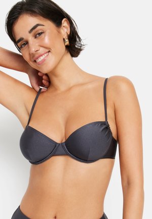 Donkergrijs push-up bikini top met dunne verstelbare bandjes, gevormde cups en een naadloos ontwerp. Subtiele glans op de gladde stof.