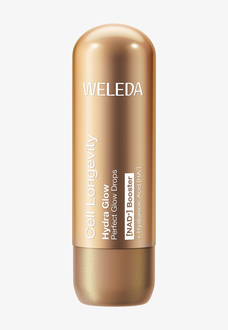 Sérum facial Weleda Cell Longevity Hydra Glow dans un flacon métallique doré en forme de capsule avec des détails du produit sur le devant.