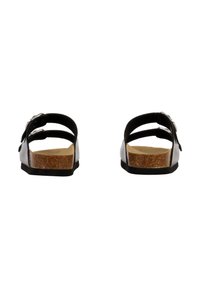 Sandales noires avec deux sangles réglables, semelle en liège et semelle en caoutchouc. Présente une finition lisse et un design minimaliste.