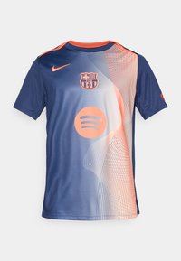 Blue and orange FC Barcelona soccer jersey with Spotify logo, Nike swoosh, and abstract wave patterns on the front.