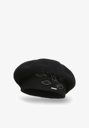 Beret de punto negro con un patrón decorativo de formas de ojo hechos de pequeños rhinestones negros. Incluye un acento de color plateado.