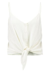 Vit ärmlös crop top med tunna axelband, framknappar och en knut i fållen.