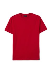 Maglietta rossa a maniche corte con collo rotondo, caratterizzata da un piccolo etichetta con logo nero e giallo sul bordo inferiore, su sfondo bianco.