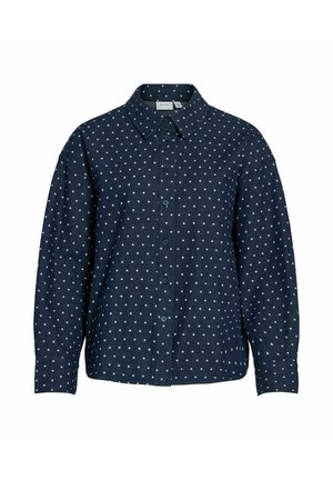 Navy blue button-up shirt with white polka dots, featuring a pointed collar, long sleeves, and a relaxed fit. Soft, textured fabric.
