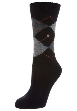 Calzino con motivo argyle in nero e grigio con accenti rossi, realizzato in materiale lavorato a maglia, con un polsino rinforzato e un piccolo bottone decorativo.