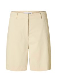 Pantaloni corti in cotone beige chiaro con frontale piatto, passanti per cintura e due tasche laterali. Design classico e taglio a ginocchio. Texture liscia.